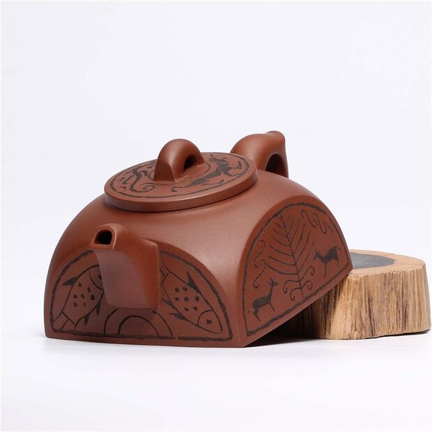 Чайники в форме черепицы (瓦当壶)